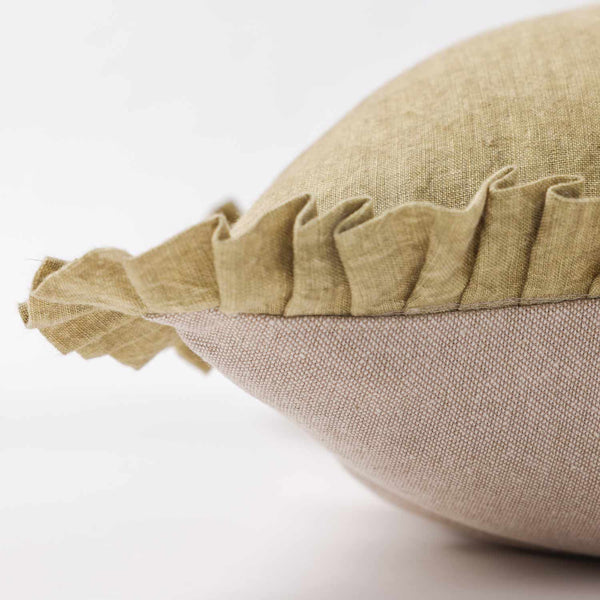 Olive dyed linen cushion cover with frills by Obeetee - angle view