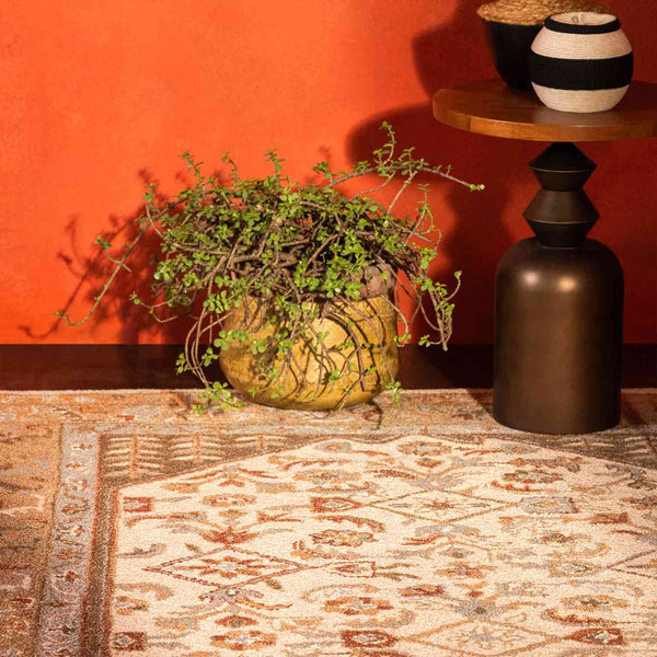 Nisa hand tufted woollen rug by Obeetee - styled view