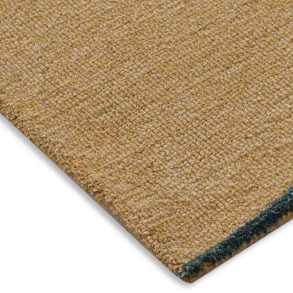 Karim hand tufted wool and viscose rug by Obeetee - angle view