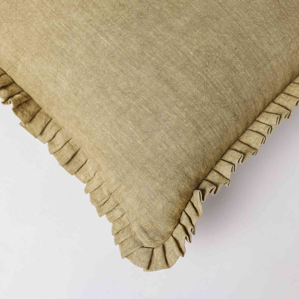Olive dyed linen cushion cover with frills by Obeetee - detail view