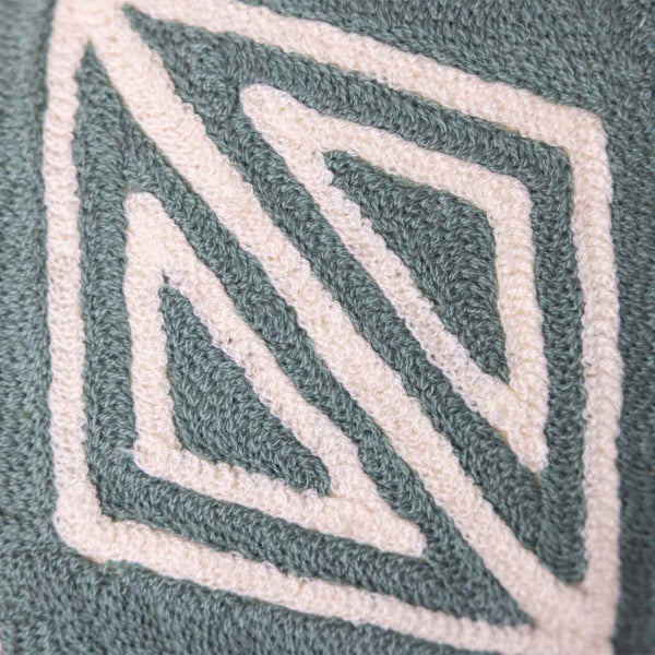 Bororo chambray cushion cover with Aari embroidery by Obeetee - texture detail