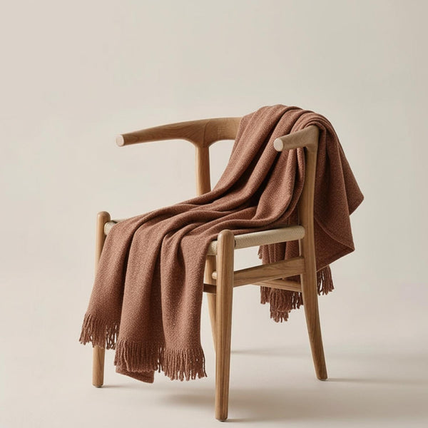 Barka cotton dobby throw by Obeetee - styled view