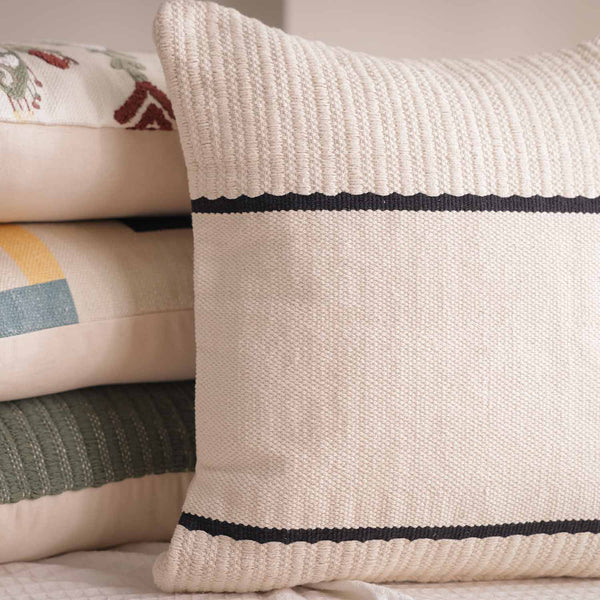 Striplaid Monochrome hand woven cotton cushion cover by Obeetee - styled view