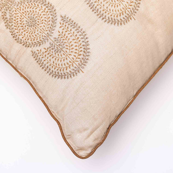Nilay silk block printed gold embroidered cushion cover by Obeetee - styled view