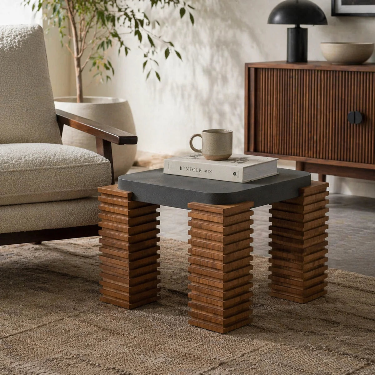 Modern coffee table with wooden legs in a living room setting