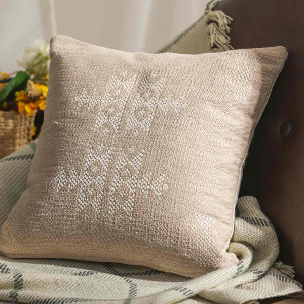 Nazakat hand woven beige cotton cushion cover by Obeetee - styled view