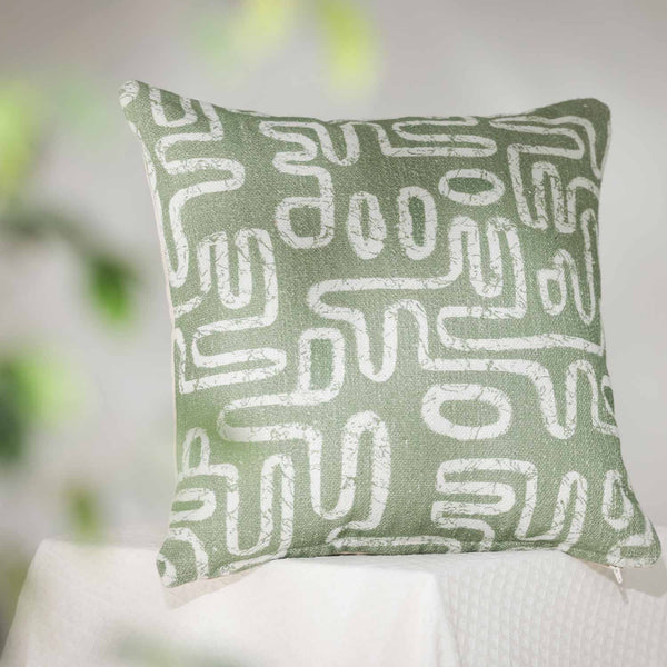A-Maze Green digital printed cotton cushion cover by Obeetee - styled view