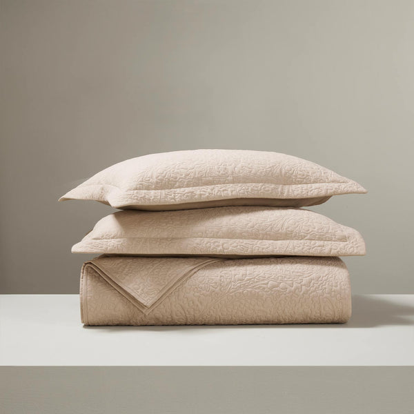 Blaze embroidered bed cover set by Obeetee - styled view