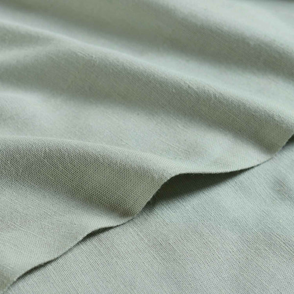 Azure linen bedsheet set by Obeetee - folded view