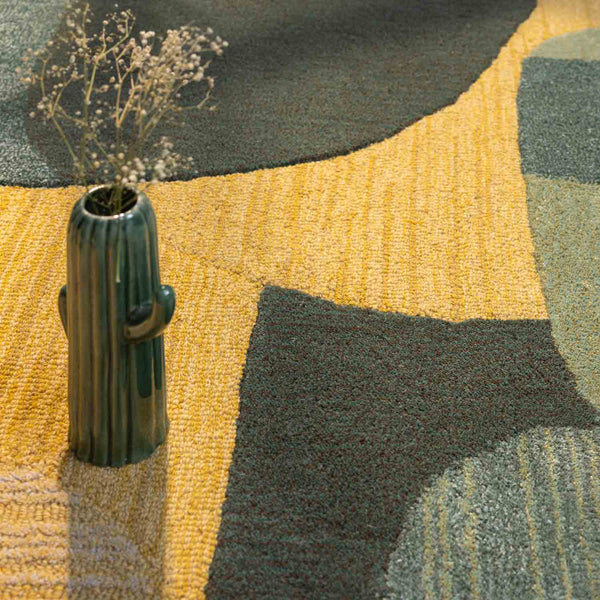 Karim hand tufted wool and viscose rug by Obeetee - styled view