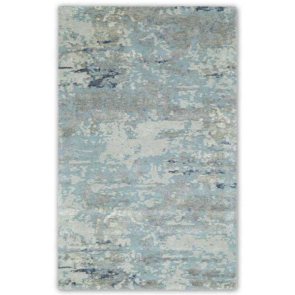 Rumi hand tufted wool and viscose rug by Obeetee - angle view