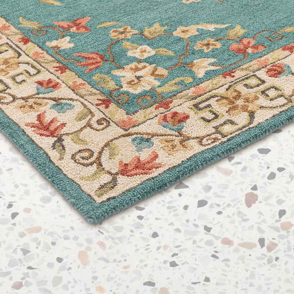 Abuson hand tufted woollen rug by Obeetee - angle view