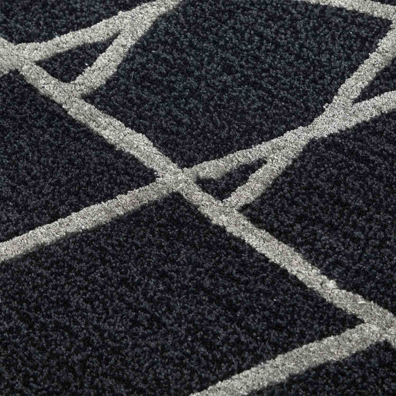 Geometric Motion Hand Tufted Woollen And Viscose Rug By Shripal Munshi