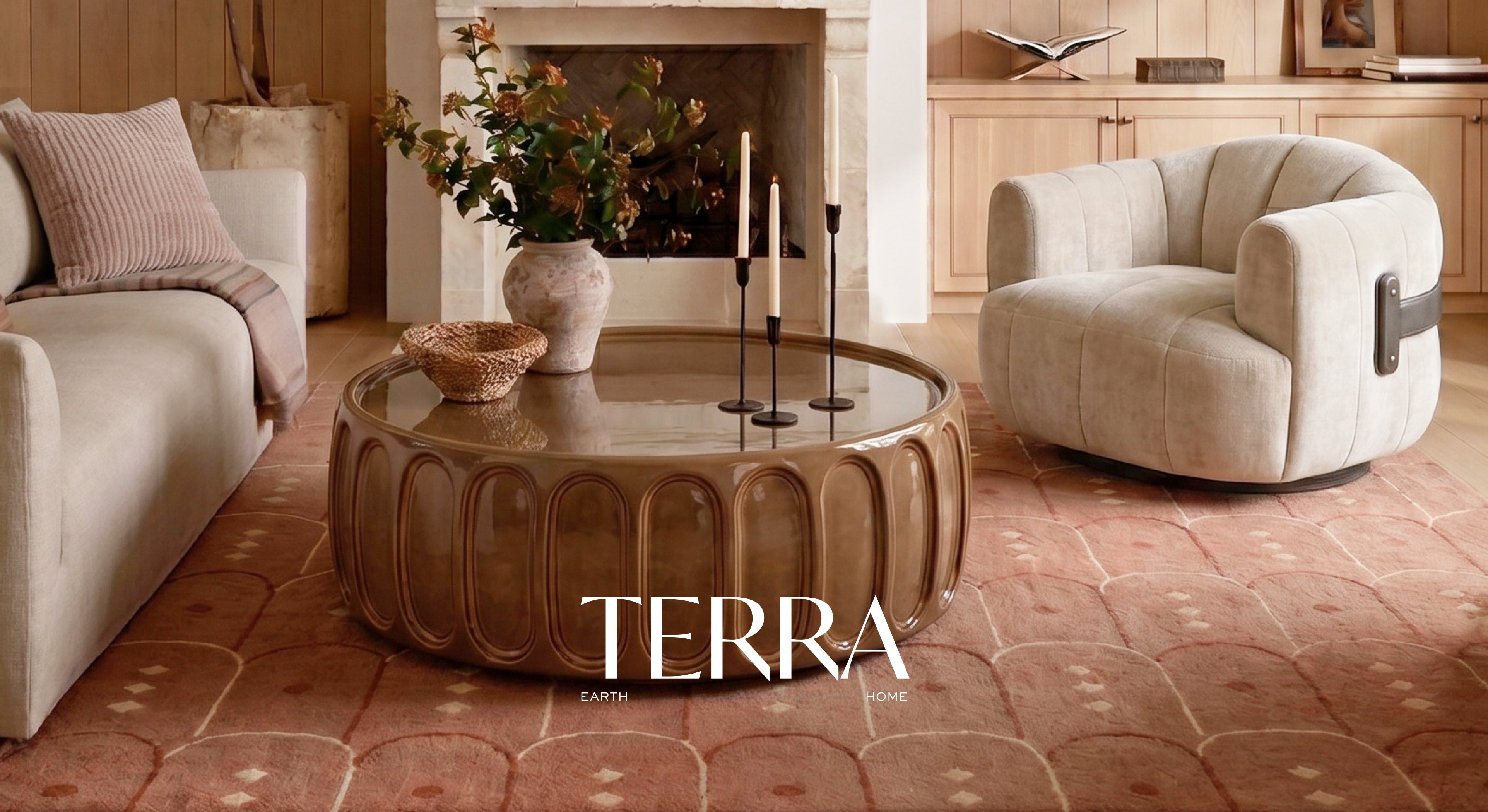 Living room with beige sofa, round glass coffee table, and armchair, featuring the brand 'Terra'.