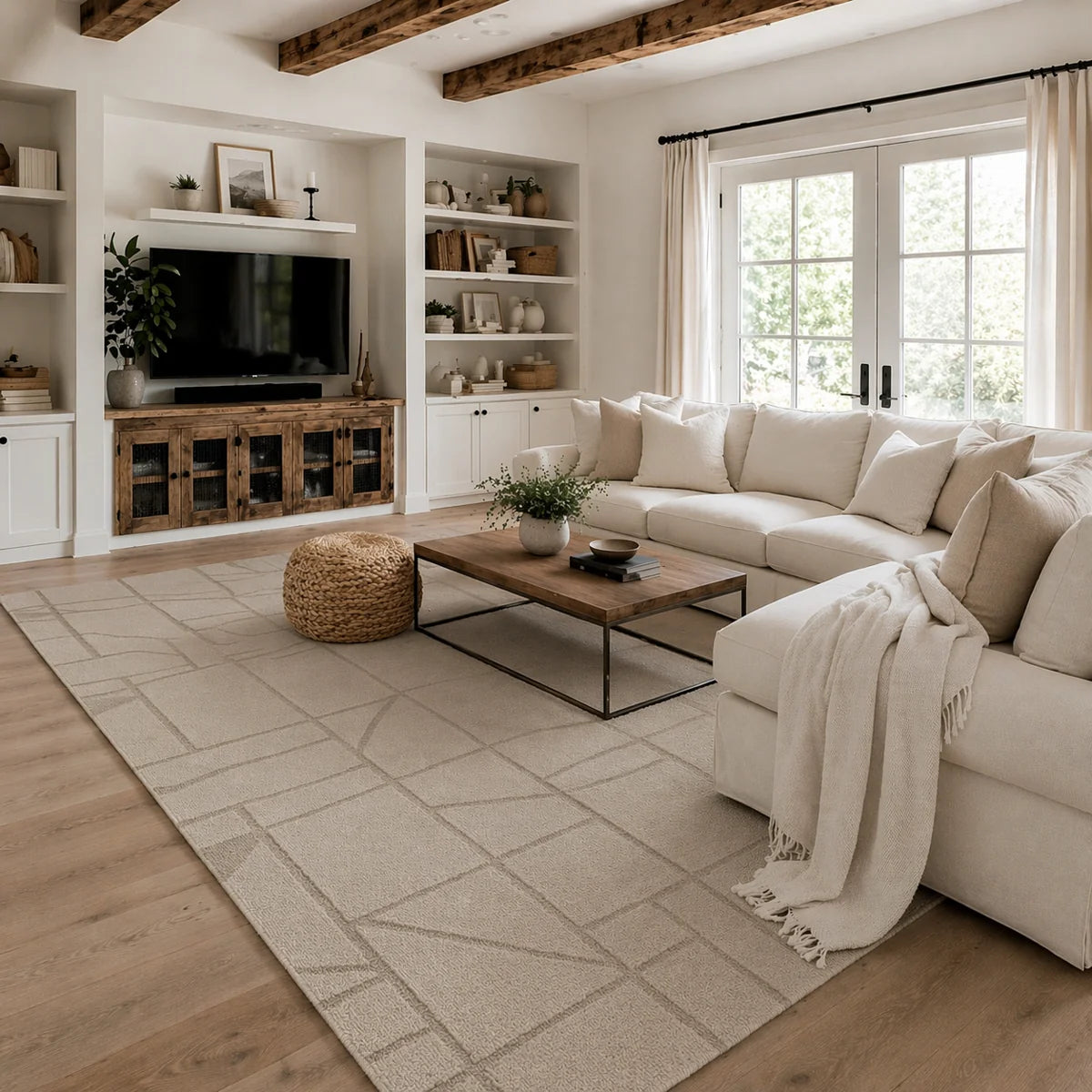 Cozy living room with a sectional sofa, coffee table, and decorative items.